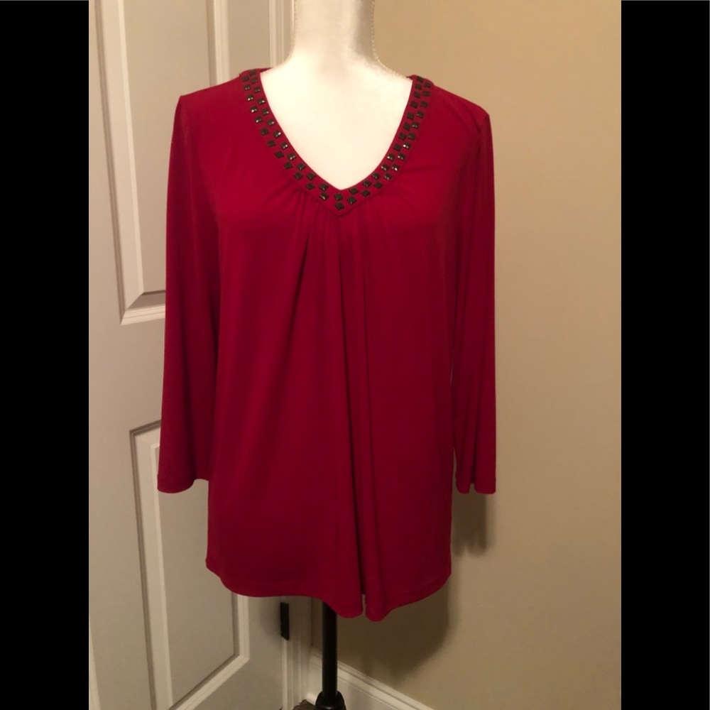 Red V neck Top.